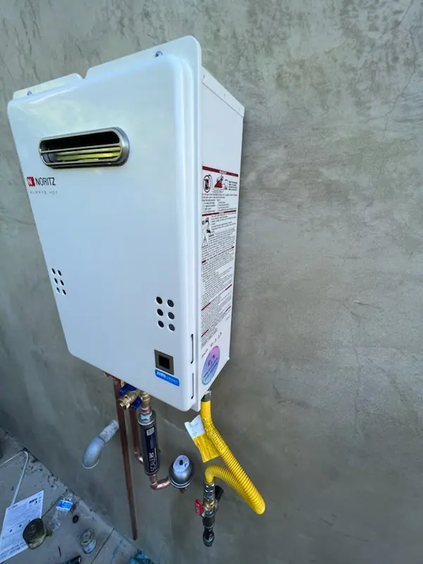 Tankless water heater installation for William Dunlap Homes homes
